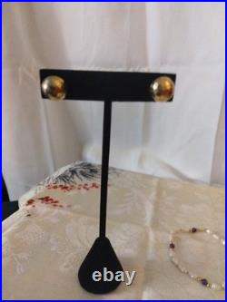 14 Karat Gold Dome Stud Earrings With A 14 Karat Gold Pearl Amethyst