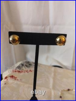 14 Karat Gold Dome Stud Earrings With A 14 Karat Gold Pearl Amethyst