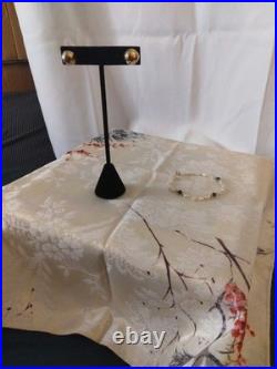 14 Karat Gold Dome Stud Earrings With A 14 Karat Gold Pearl Amethyst