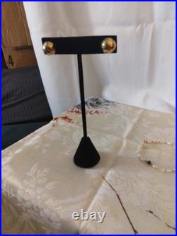 14 Karat Gold Dome Stud Earrings With A 14 Karat Gold Pearl Amethyst