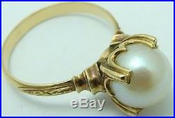 14 carat yellow gold Pearl set ring Size M 1/2