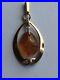14-carat-yellow-gold-pendant-set-with-inset-Amber-drop-01-xry