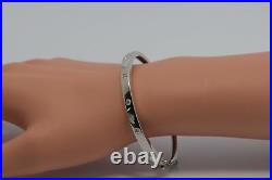 14K White Gold Diamond bangle bracelet with round diamonds set throughout