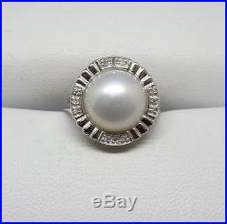 14k WHITE GOLD PAVE SET DIAMONDS AND WHITE MOTHER OF PEARL RING