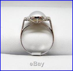 14k WHITE GOLD PAVE SET DIAMONDS AND WHITE MOTHER OF PEARL RING