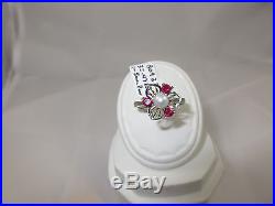 14k White Gold Ring set with 3=. 47ct Round Ruby and 1-5mm Pearl