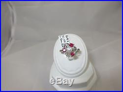 14k White Gold Ring set with 3=. 47ct Round Ruby and 1-5mm Pearl