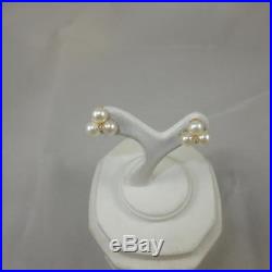 14k Yellow Gold Earrings set with 6-5mm Pearls and 2=. 02ct Natural Diamonds