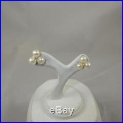 14k Yellow Gold Earrings set with 6-5mm Pearls and 2=. 02ct Natural Diamonds