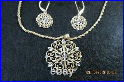 14k gold earrings and necklace set. Diamond cut gold pendant and earrings