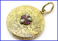 15ct yellow gold round engraved locket ruby & pearl set Early 19th century