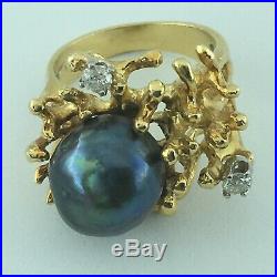 18 kt yellow gold ring with 12mm black pearl & 2 diamonds modern brutalist setting