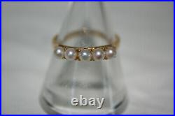 18ct Gold ring set with 5 pearls size L1/2