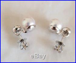 18ct White gold stud earrings. Collet set with Brilliant cut Diamonds & pearls