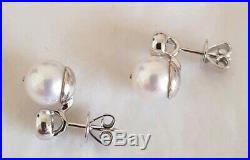 18ct White gold stud earrings. Collet set with Brilliant cut Diamonds & pearls