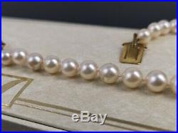 19 1/2 Cultured Pearl Necklace with Ruby Set and 9K Carat Gold Clasp