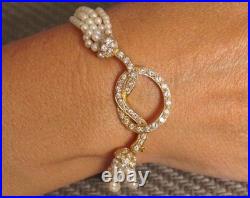 7 STRAND PEARL & DIAMOND NECKLACE/BRACELET SET (18kt YELLOW GOLD)