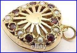 9 Carat Hallmarked yellow gold filigree front pearl and garnet set heart locket
