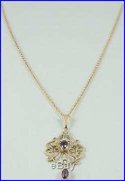 9 Carat gold Edwardian pearl and gem set pendant on a 17 inch 9ct chain