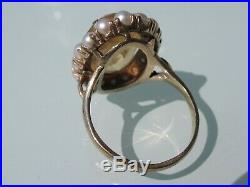 9ct Gold dress ring set with large oval citrine surrounded by seed pearls