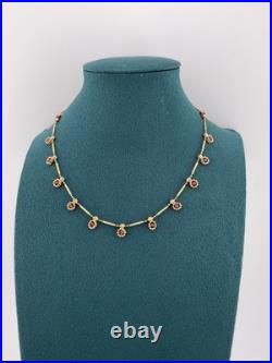 A Delicate 18k Sold Gold Italian Set Featuring Beaded Links And Drop Ruby A Delicate 18k Sold Gold Italian Set Featuring Beaded Links And Drop Ruby