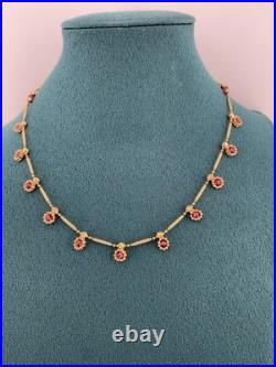 A Delicate 18k Sold Gold Italian Set Featuring Beaded Links And Drop Ruby