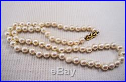 A Fabulous Vintage Pearl Necklace set in 9ct Yellow Gold