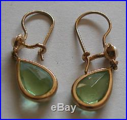 A Fine 9k Yellow Gold Pair Of Earrings Set With Drop Shape Peridot And A Pearl