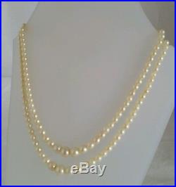 A Vintage twin Strand Pearl necklace. 9ct gold clasp, set with Rose cut diamonds