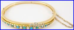Antique 15 carat Yellow gold turquoise and pearl set 6.5 inch oval hinged bangle