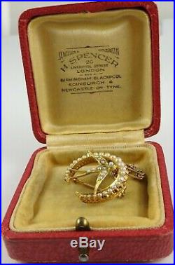 Antique 15ct Gold seed pearl set crescent swallow brooch. In an antique box