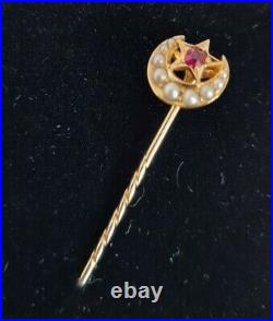 Antique 18ct Yellow Gold Moon stick pin. Claw set a with a Ruby & Seed Pearls