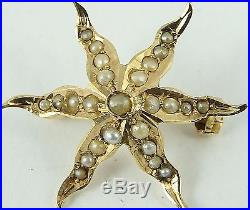 Antique 9 Carat yellow gold pearl set star brooch or pendant