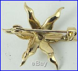 Antique 9 Carat yellow gold pearl set star brooch or pendant