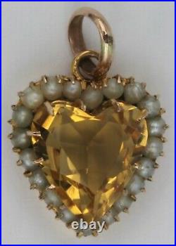 Antique 9ct gold topaz & seed pearl set heart shaped pendant. 15.5mm. 1.3 grams
