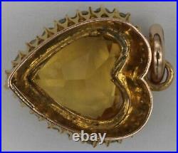 Antique 9ct gold topaz & seed pearl set heart shaped pendant. 15.5mm. 1.3 grams