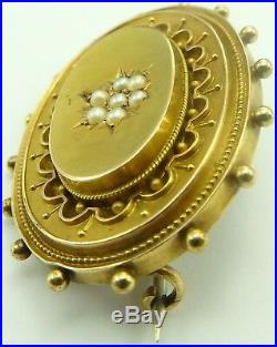 Antique Victorian 15 carat yellow gold seed pearl set locket back brooch