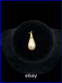 Baroque Pearl Secured By A Hammered 10k Gold Setting