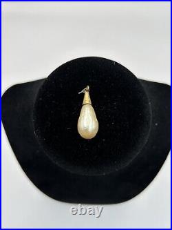 Baroque Pearl Secured By A Hammered 10k Gold Setting