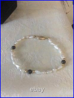 Beautiful 14 Karat Gold Pearl Knotted Necklace And Bracelet With Onyx And