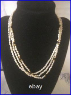 Beautiful 14 Karat Gold Pearl Knotted Necklace And Bracelet With Onyx And