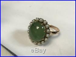 Beautiful 18KT Yellow Gold Large Oval Jade Prong Set Ring With Gorgeous Pearl Halo
