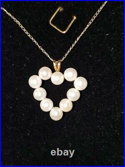 Beautiful White Pearl Heart Shaped Pendant Set On A 14kt Yellow Gold Frame