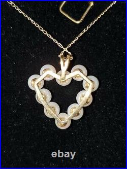 Beautiful White Pearl Heart Shaped Pendant Set On A 14kt Yellow Gold Frame