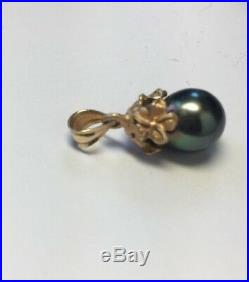 Black Tahitian Pearl Pendant set in 14K Yellow Gold Hibiscus Design Cap Bail