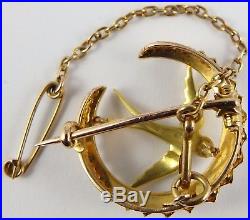 Boxed antique 15ct Gold seed pearl set crescent swallow brooch