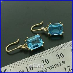 Brand New 18ct yellow white gold drop hook earrings set with natural blue topaz