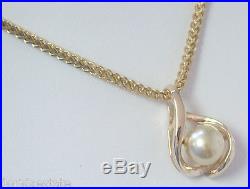 CULTURED PEARL OMEGA SLIDE OR PENDANT SET IN 14k YELLOW GOLD