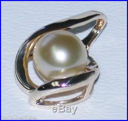 CULTURED PEARL OMEGA SLIDE OR PENDANT SET IN 14k YELLOW GOLD