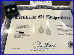 Chatham Cultured Pearl/Diamond earrings set in 14K white gold. Beautiful size